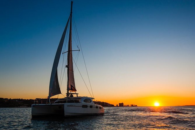 Lisbon: Sunset Cruise With Drinks on Spacious Yacht - Meeting the boat beneath the 25 de Abril Bridge