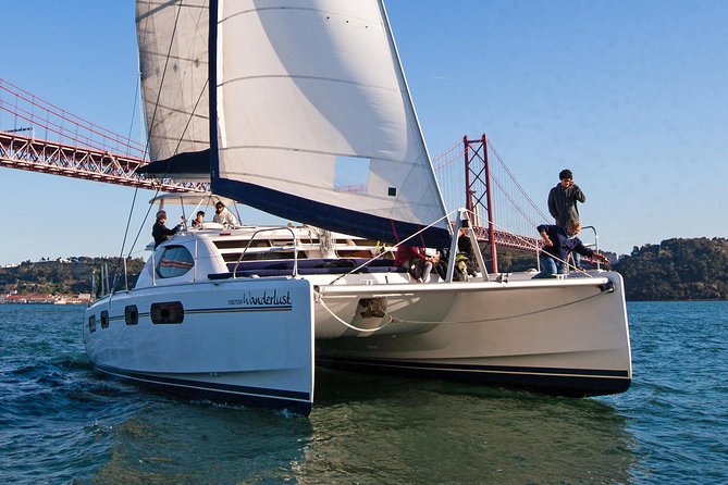 Lisbon: Sunset Cruise With Drinks on Spacious Yacht - Christ the King and the south bank