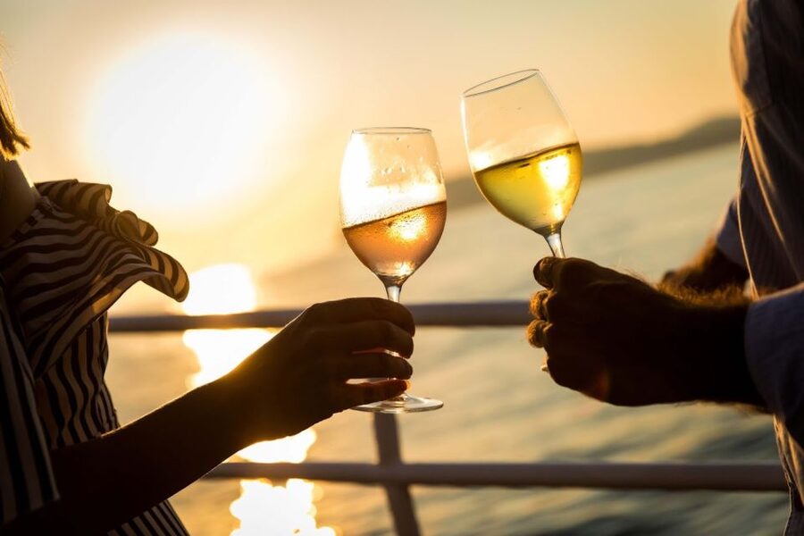 Lisbon: Sunset Sailing Boat Cruise with Wine - Crossing toward Almada and Christ the King