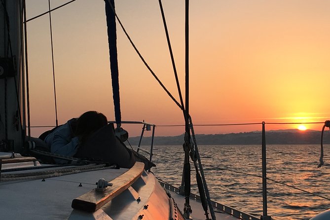 Lisbon Sunset Sailing Tour with White or Rosé Wine and Snacks - Royal palaces and the old museum waterfront