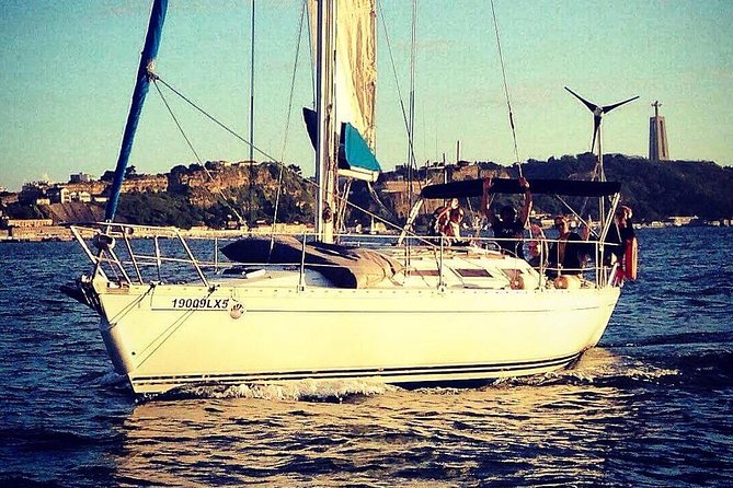 Lisbon Sunset Sailing Tour with White or Rosé Wine and Snacks - Cristo Rei and Lisbon from the south bank