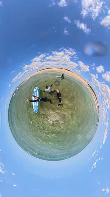 Lisbon: Surfing Lesson on Costa de Caparica Beach - Getting fitted with a wetsuit and board