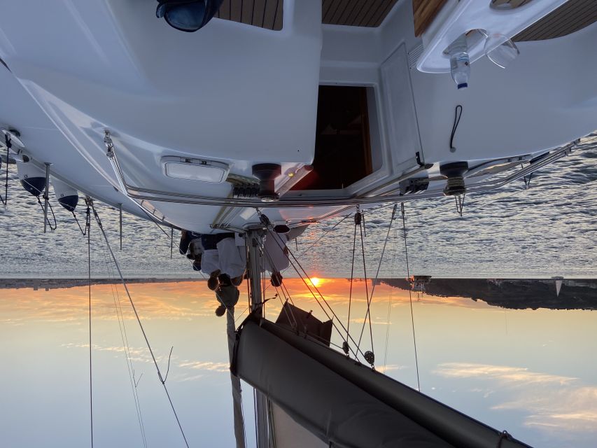 Lisbon: Tagus River Sailboat City Cruise - Under the 25 de Abril Bridge toward central Lisbon