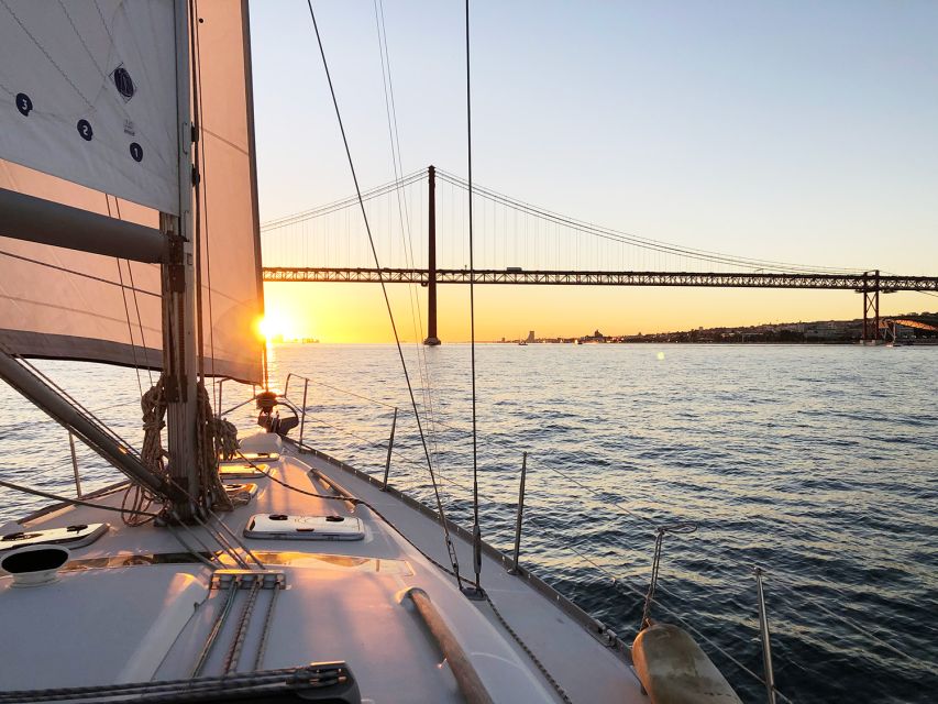 Lisbon: Tagus River Sunset Cruise with Drinks - Cacilhas and Christ the King across the river