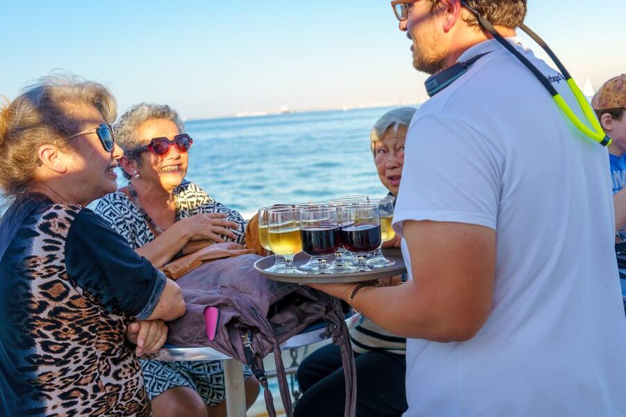 Lisbon: Tagus River Sunset Tour with Snacks and Drink - Wine, cake, bread, and small Portuguese tastes
