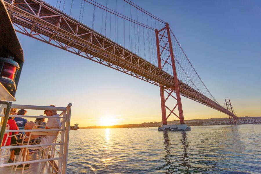Lisbon: Tagus River Sunset Tour with Snacks and Drink - Christ the King across the Tagus