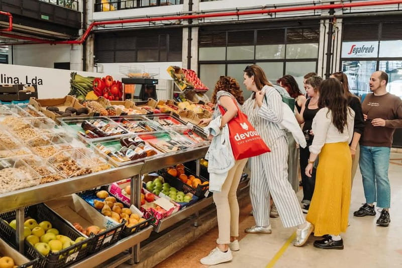 Lisbon: Tastes and Traditions Guided Food Tour - Praça da Figueira and the first old-world shops