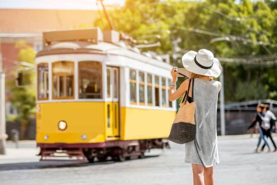 Lisbon: Tram 28 Entry Ticket & Audio Guide with 24-Hour Pass - Starting at Rossio Square with practical local advice