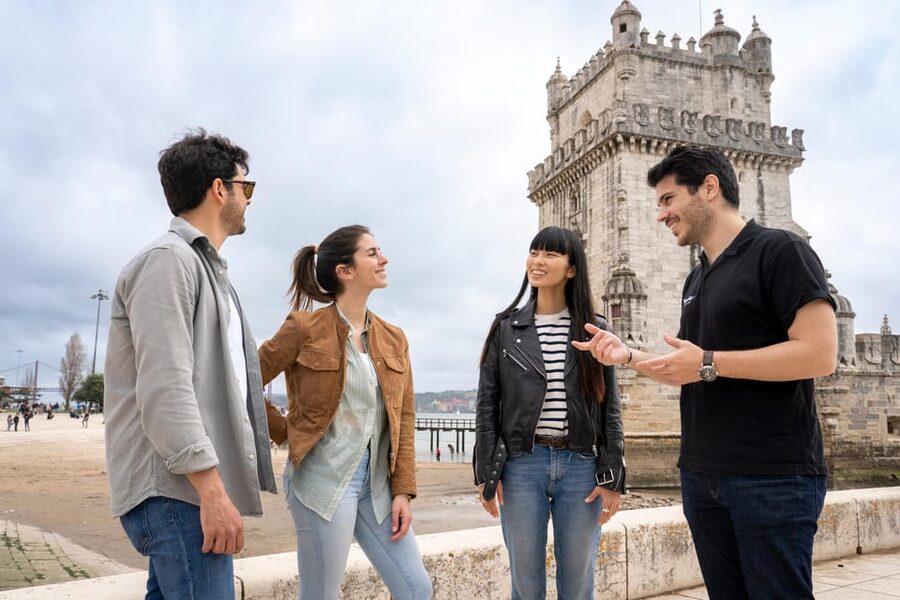 Lisbon: Walking Tour, Belém Neighborhood, Tram and Boat Ride - Alfama on foot: rewarding, steep, and not effortless