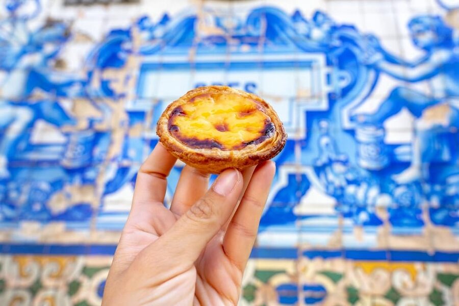 Lisbon: Walking Tour, Belém Neighborhood, Tram and Boat Ride - Starting at Praça Dom Pedro IV and entering old Lisbon