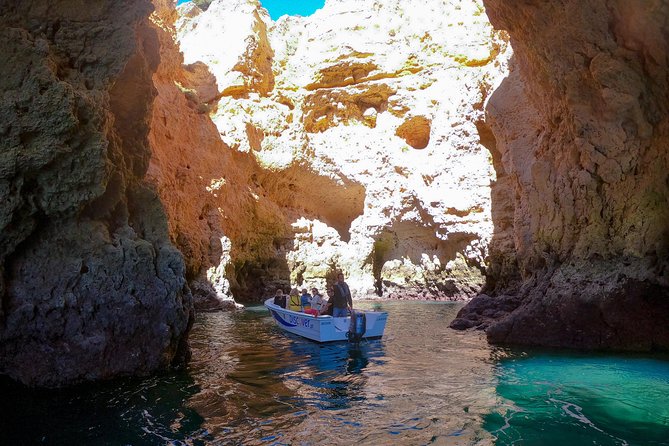 Ponta da Piedade Boat Tour to Caves and Beaches with Local Guide - Batata, Pinhão, and D. Ana from the water