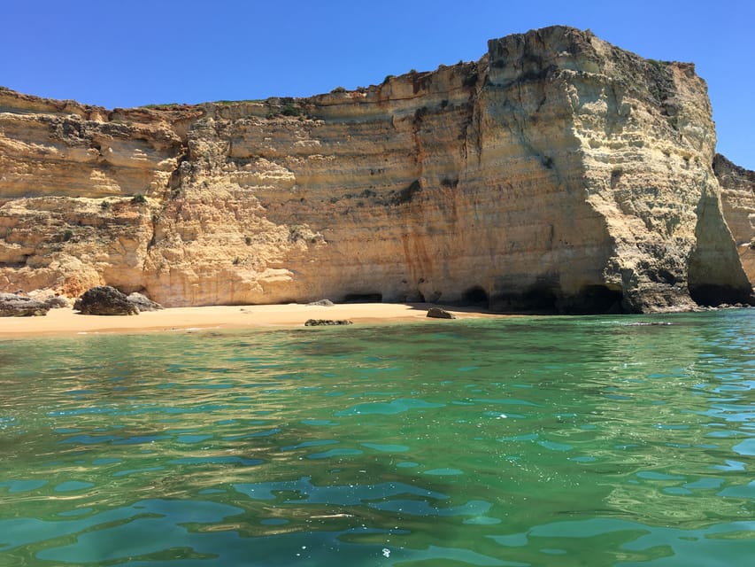Portimão: Caves, Benagil and Algarve Coastline Boat Tour - Champagne, soda, and the final return