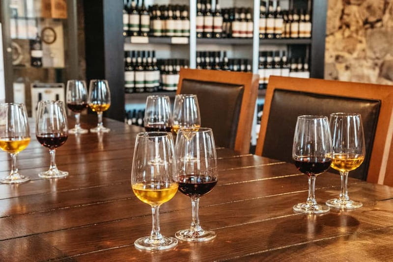 Porto: Bridges Cruise with Wine Cellar Tour or Sunset Option - Porto’s old waterfront from the Douro