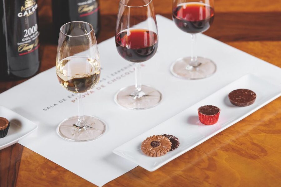 Porto: Cálem Cellar with Chocolate, Cheese, and Wine Tasting - Walking through the active cellar