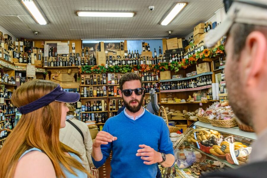 Porto: Delicious Food and Wine Walking Tour - Walking pace, meeting point and weather