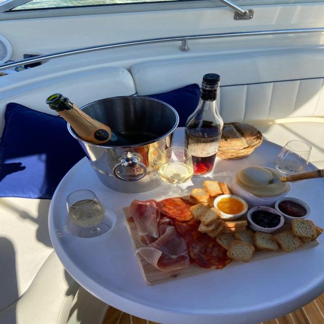 Porto: Douro River Boat Tour w/ Portuguese Wines & Tasting - Setting off on the Douro aboard the 27-foot SMILE