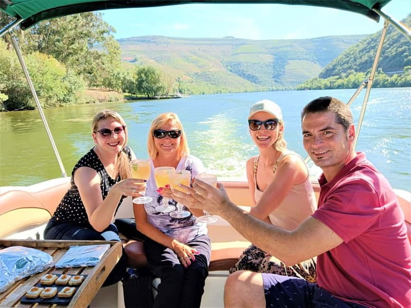 Porto: Douro Valley, 2 Wineries, Lunch & Private Boat Trip - A private boat with Port and local snacks