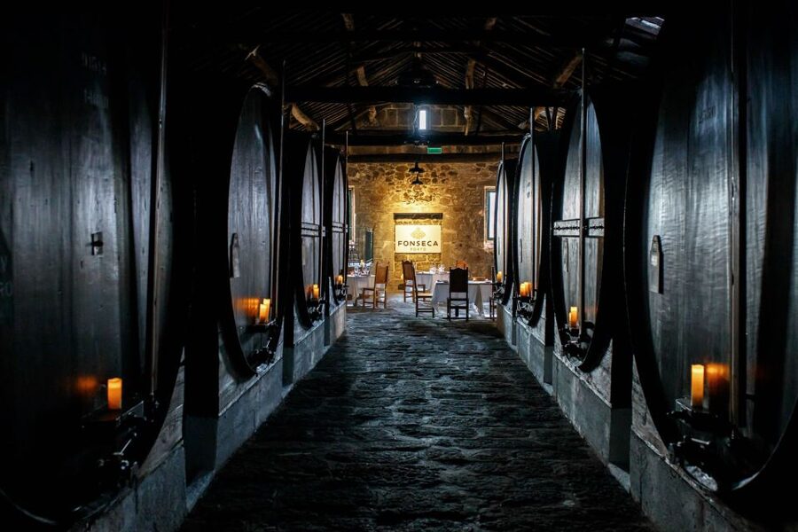 Porto: Fonseca Cellar Tour & Fado Show with Optional Dinner - Entering Fonseca’s historic cellars