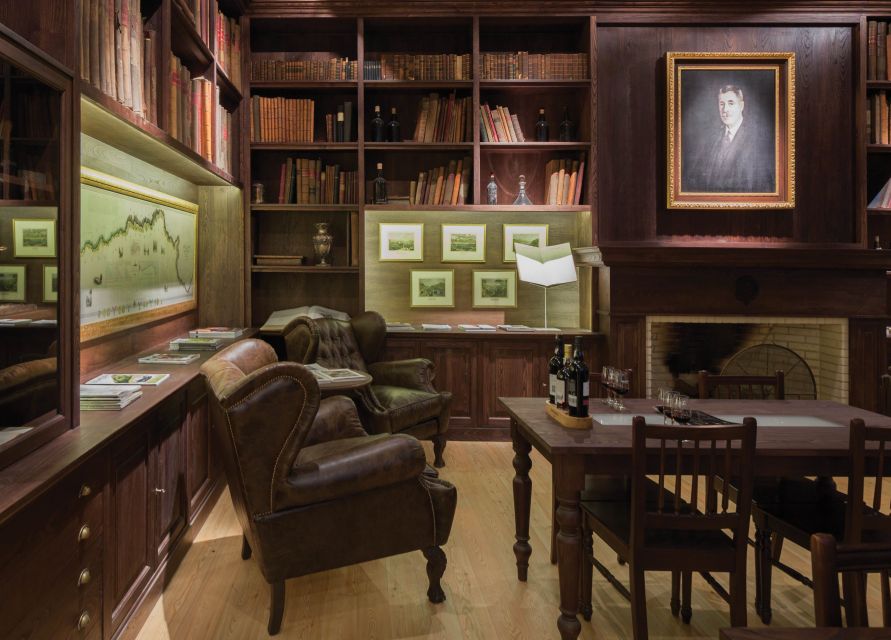 Porto: Graham's Port Lodge Tour & Vintage Room Wine Tasting - Inside a cellar with 2,000 oak pipes