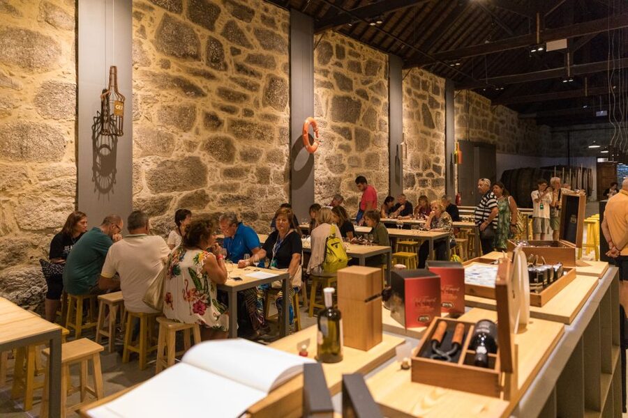Porto: Guided Tour and Tasting of 3 Port Wines at Poças - Inside a cellar where Port rests for decades