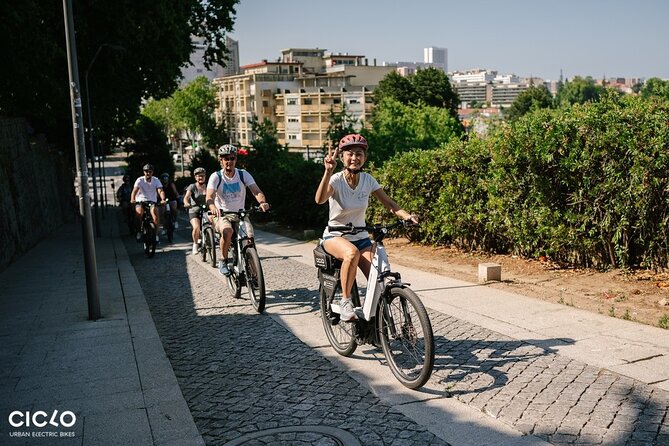 Porto Highlights in 3 Hours E-Bike Tour - Historical, Sightseeing - Clérigos Tower and the central streets