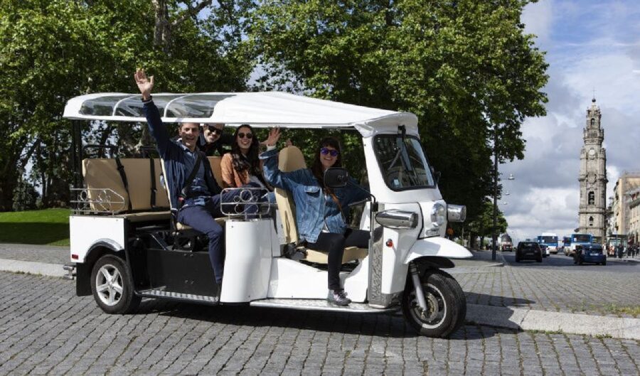 Porto: Private Sightseeing Tour by Electric Tuk Tuk - Crossing the Luís I Bridge toward Gaia