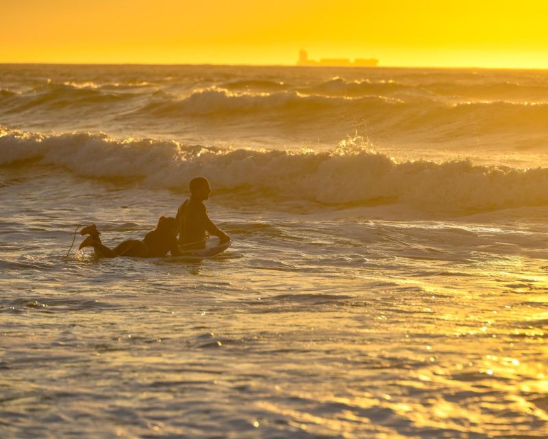 Porto: Small Group Surfing Experience with Transportation - Learning the first moves on the sand and in the water