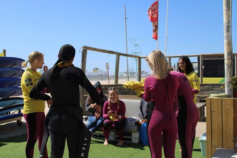 Porto: Surf Lesson with the First Surf School in Porto! - Getting fitted with a wetsuit and board