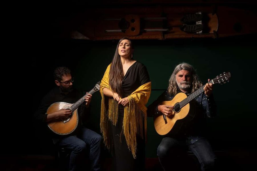 Porto: The Authentic Fado Concert with Port Wine - A glass of Poças Port with the music