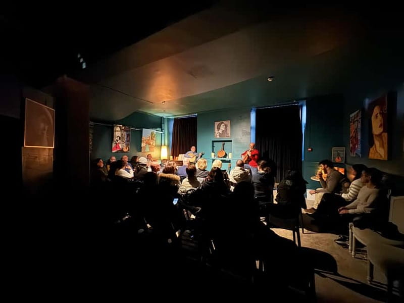 Porto: Traditional Fado Show at Sao Bento with Port Wine - The voices, guitars, and emotional force
