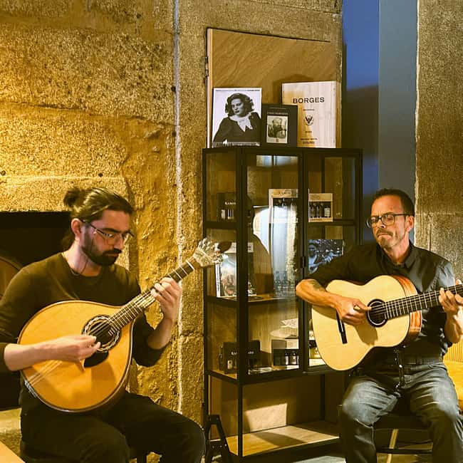 Porto: Traditional Fado Show with Welcome Drink - A warm welcome and a drink from the wine bar