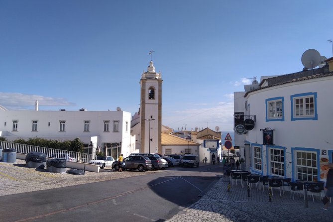 Private Guided Tuk Tuk Tour with pick-up and drop-off in Albufeira - Farol da Baleira and the Fisherman Harbour