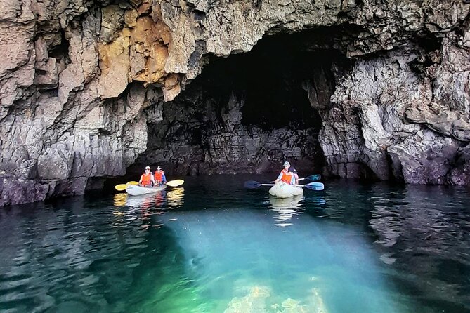 Sagres: Praia Da Ingrina Caves Guided Kayaking Tour - Paddling through grottos and purple rock formations