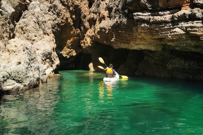 Sagres: Praia Da Ingrina Caves Guided Kayaking Tour - Group size, guides, and the feel of the outing