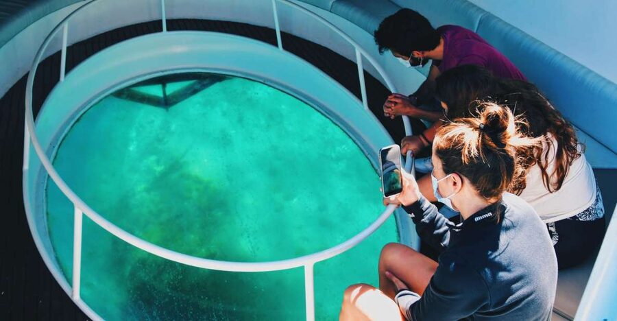 São Miguel: Glass Bottom Boat Tour with Snorkeling - Crossing toward Ilhéu de Vila Franca do Campo