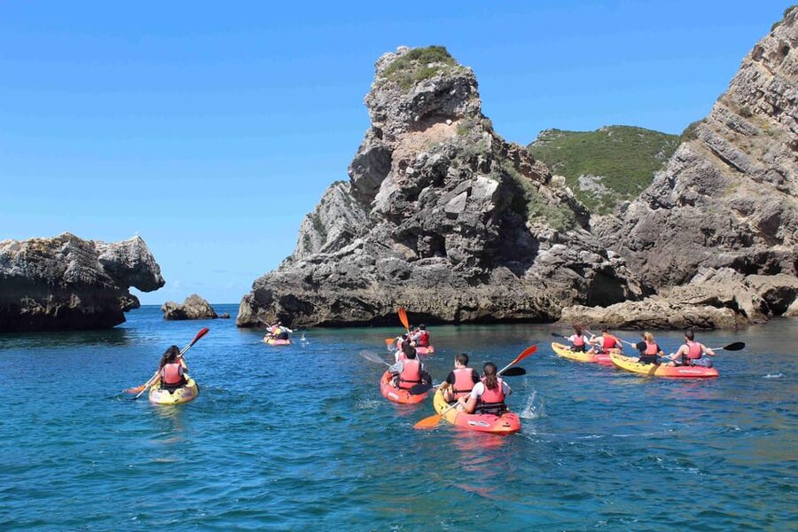 Sesimbra: Ribeiro Cavalo Beach, Caves, & Arrábida Kayak Tour - The paddle is easy for some, tiring for others