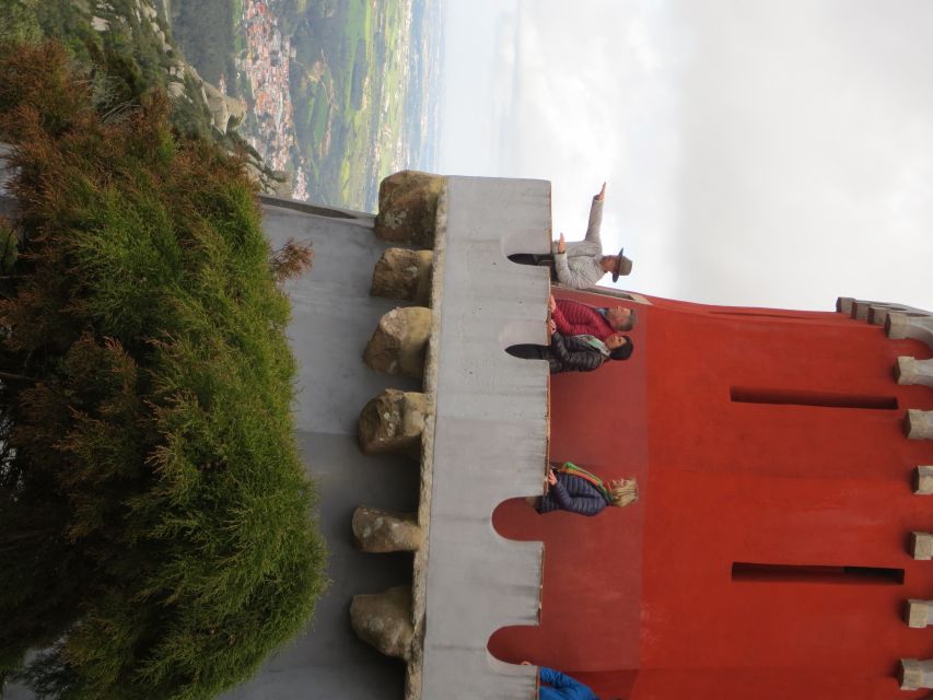 Sintra: Walking Tour with Palace, Castle, and Old Town Visit - The Moorish Castle: walls above the trees