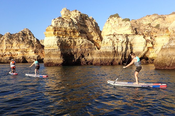 Sunrise SUP Caves Tour in Lagos – Small Group Experience - Arches, tunnels, and the Love Cave