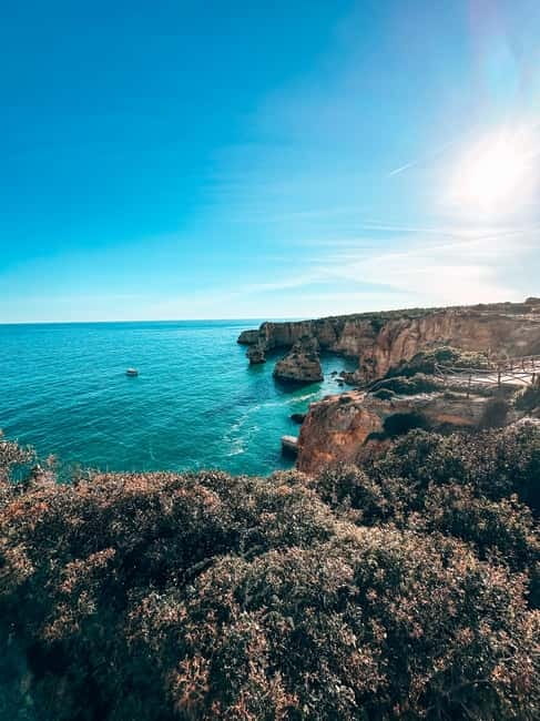 The Original 7 Hanging Valleys Guided Hike With Pickup - Praia da Marinha provides the grand finish