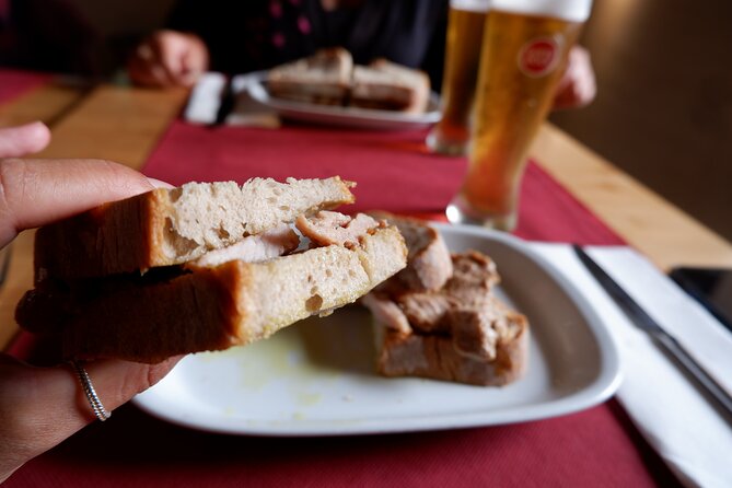Winner 2025 Undiscovered Lisbon Food & Wine Tour by Eating Europe - Walking through Mouraria, the home of Fado